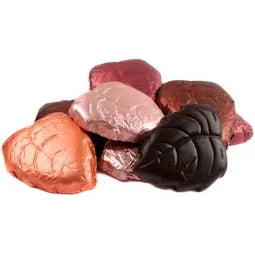 Dark chocolate leaves in rose gold foil