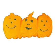 Three orange Pumpkin Peeps marshmallow candies with smiling jack-o'-lantern faces