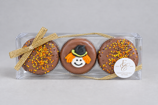 Halloween chocolate covered Oreo 3-pack gift box with a royal icing Halloween design and fall sprinkles