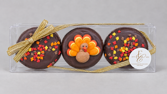 Thanksgiving chocolate covered Oreo 3-pack gift box with a royal icing turkey and autumn leaf sprinkles
